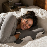 Relaxed and smiling on the Numa pillow